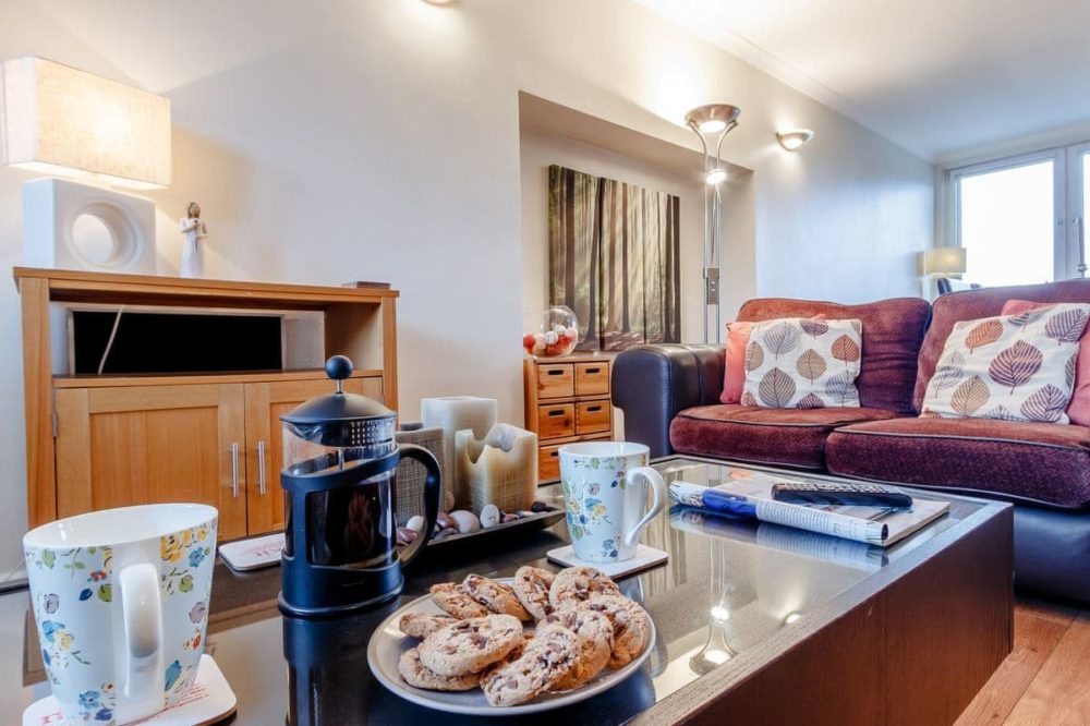 Dual aspect living and dining area with comfy seating for all